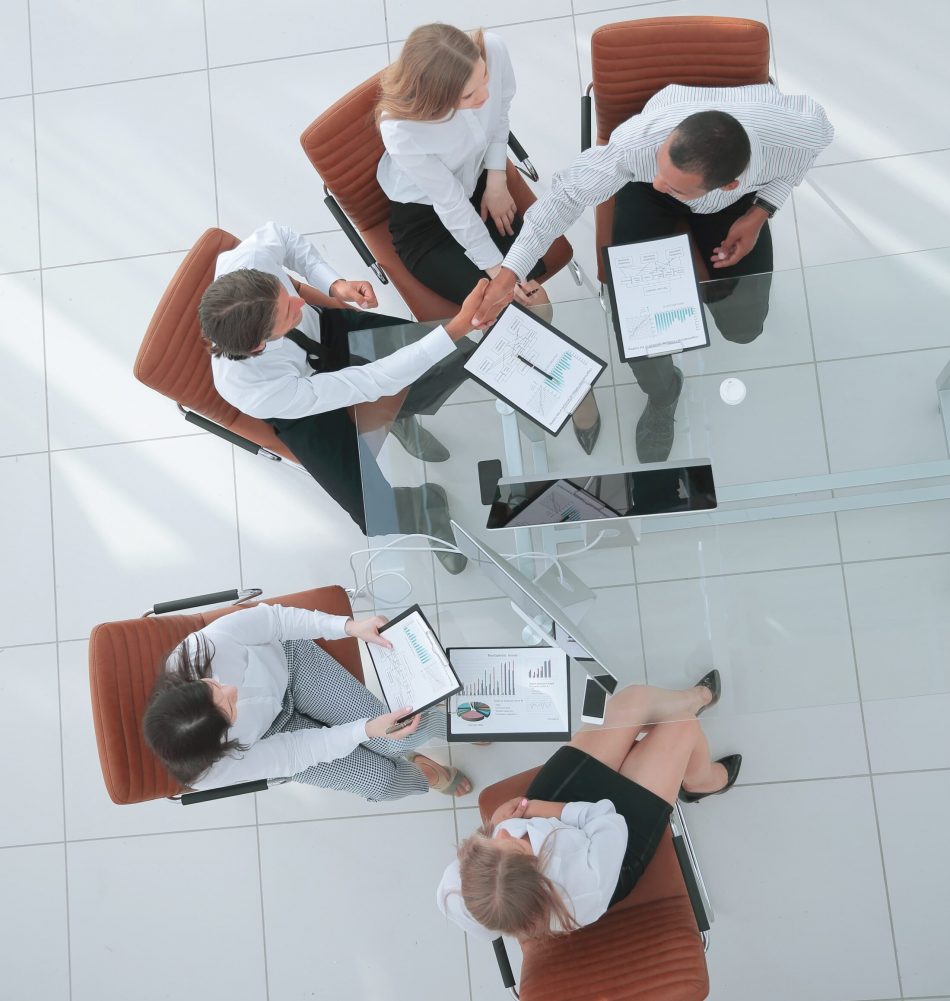 view-from-topthe-handshake-business-partners-meeting (1) view-from-topthe-handshake-business-partners-meeting (1)